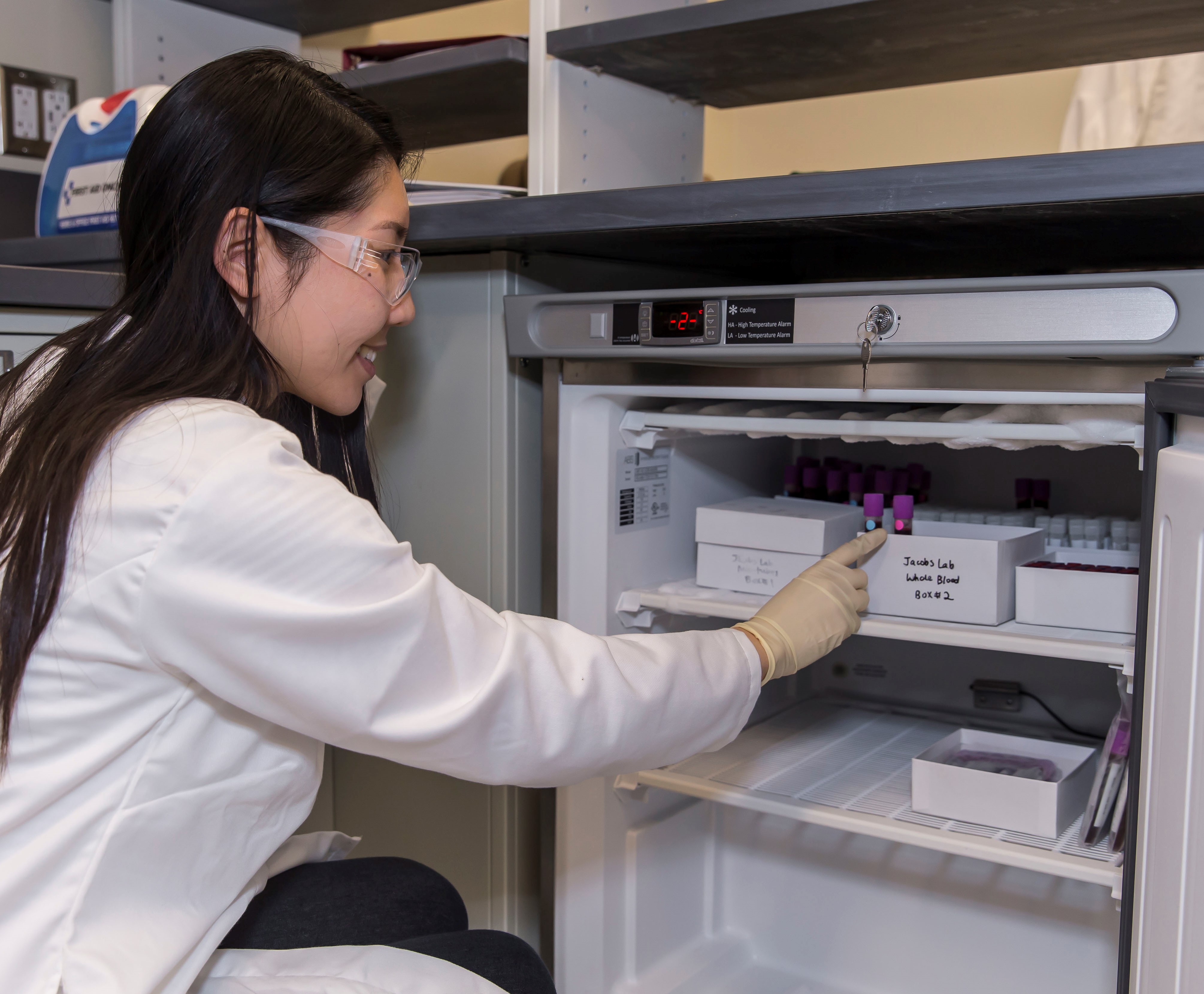 Donning on proper PPE (white lab coat, safety goggles, and latex gloves) to centrifuge blood, aliquot serum, and store cryovials into our freezer for future hormone assays. Being a female scientist is a pretty cool job!